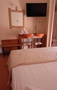 Postel nebo postele na pokoji v ubytování Efstratios Hotel