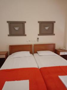 Postel nebo postele na pokoji v ubytování Efstratios Hotel