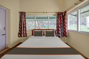 Postel nebo postele na pokoji v ubytování STARLIGHT HOTELS KODAI