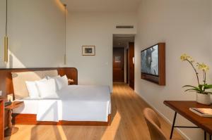 Televízia a/alebo spoločenská miestnosť v ubytovaní Wuyu Hotel, Smart Park & Happy Valley Jinshansi Metro