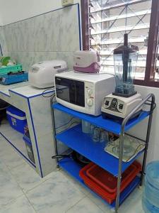 Η κουζίνα ή μικρή κουζίνα στο Greenhouse homestay betong