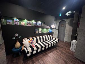 Area soggiorno di ＩＲＡＧＯ　ＡＲＴ　 ＨＯＴＥＬ 　THECAPE