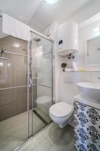 Ένα μπάνιο στο Central Split rooms and apartments Paese