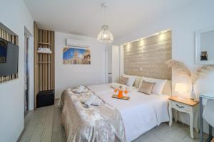 Ένα ή περισσότερα κρεβάτια σε δωμάτιο στο Central Split rooms and apartments Paese