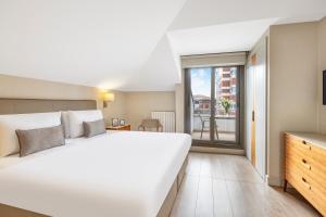 Postel nebo postele na pokoji v ubytování Tzl Suites Hotel Nişantaşı + 37 fotografií