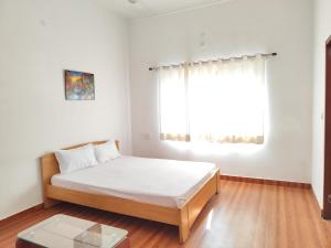 Postel nebo postele na pokoji v ubytování Ghughuti Homestay + 6 fotografií