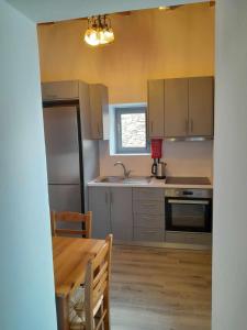 Kuchyň nebo kuchyňský kout v ubytování "Zeus House" Sevasti Symi Studios