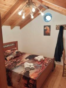 a bedroom with a large bed in a room at "Zeus House" Sevasti Symi Studios in Symi