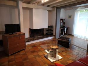 TV a/nebo společenská místnost v ubytování La Capeline