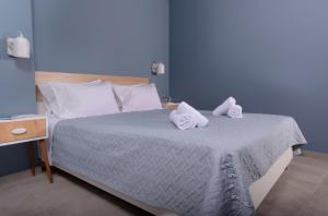Postel nebo postele na pokoji v ubytování antéste Ierapetra sea & city