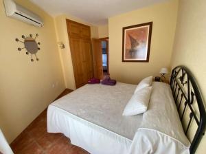 Katil atau katil-katil dalam bilik di Duplex Barbados Aguamarga