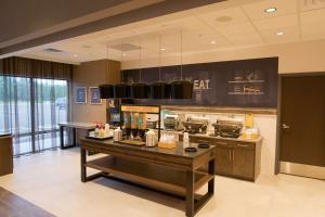 A restaurant or other place to eat at Hampton Inn West Wichita Goddard