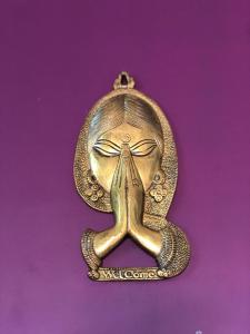 a gold medal with an image of an octopus at Mahagiri Nest in Mysore