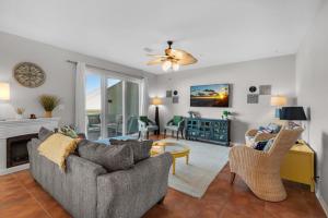 a living room with a couch and chairs at Bonita Bay in Pensacola Beach