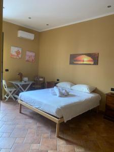 Postel nebo postele na pokoji v ubytování Casa Alice