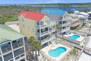 an aerial view of a resort with a swimming pool at Villa del Sol by Pristine Property Vacation Rentals in Cape San Blas