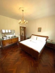 Ένα ή περισσότερα κρεβάτια σε δωμάτιο στο Casa dei Nonni