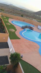 The swimming pool at or close to La flor del Atlantico