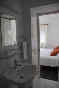 Postel nebo postele na pokoji v ubytování Hotel Misty