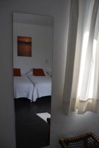 Postel nebo postele na pokoji v ubytování Hotel Misty