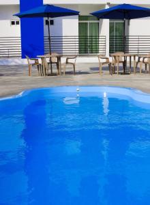 Bazén v ubytování Global Express Hotel Escarcega nebo v jeho okolí