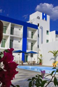 Bazén v ubytování Global Express Hotel Escarcega nebo v jeho okolí