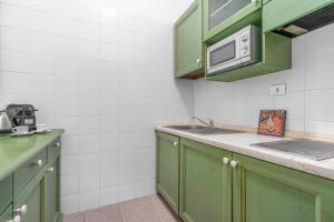 Casa da Suite Fraschini tesisinde mutfak veya mini mutfak