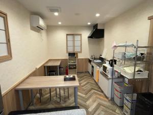 Kuchyň nebo kuchyňský kout v ubytování GuestHouse Guu