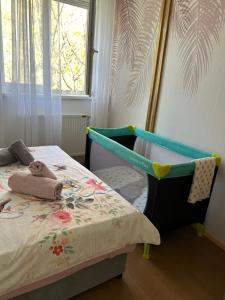 Ένα ή περισσότερα κρεβάτια σε δωμάτιο στο Blues Apartment