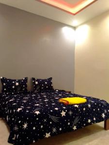 Ein Bett oder Betten in einem Zimmer der Unterkunft Villa Fama