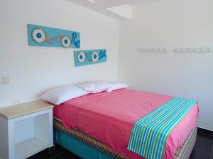 Ein Bett oder Betten in einem Zimmer der Unterkunft CASABLANCA TORRES DEL MAR 4A