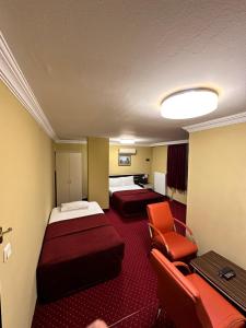 Postel nebo postele na pokoji v ubytování Minabir Otel