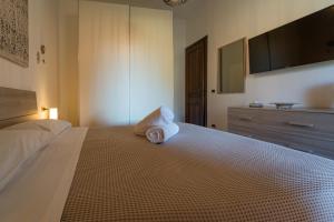 Posteľ alebo postele v izbe v ubytovaní I Colori del Tufo
