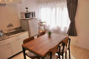 Cucina o angolo cottura di Lino下伊福 岡山駅車で5分 無料駐車場 レストラン徒歩圏内多数