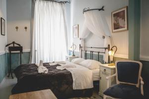 Postel nebo postele na pokoji v ubytování pension Acronafplia - classic