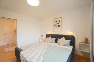 Postel nebo postele na pokoji v ubytování Südstrand Apartment