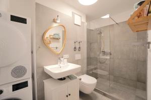 Koupelna v ubytování Südstrand Apartment + 11 fotografií