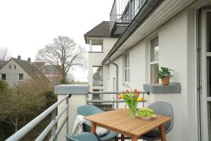 Balkón nebo terasa v ubytování Südstrand Apartment