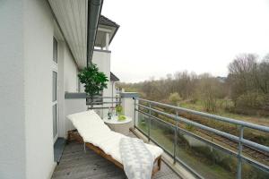 Balkón nebo terasa v ubytování Südstrand Apartment