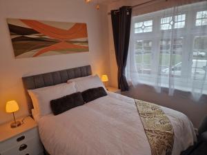 Postel nebo postele na pokoji v ubytování Steyn Guest Lodge