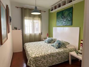 Posteľ alebo postele v izbe v ubytovaní Apartamento con jardín a 11 metros de la playa. B3.