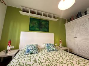 Posteľ alebo postele v izbe v ubytovaní Apartamento con jardín a 11 metros de la playa. B3.