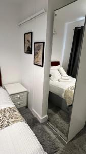 Postel nebo postele na pokoji v ubytování Steyn Guest Lodge