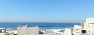 a view of the ocean from a building at Sunseaker- Beachfront Complex in Ballito