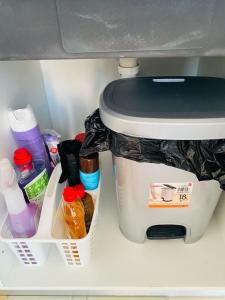 a refrigerator with a coffee pot and other items at SuAparts in Praia