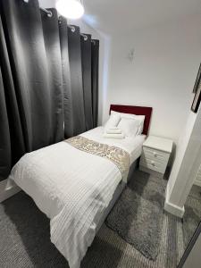 Postel nebo postele na pokoji v ubytování Steyn Guest Lodge