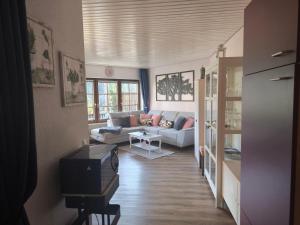 Posezení v ubytování Fewo Zeus mit großer eingezäunter Terrasse
