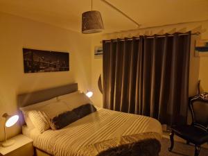 Postel nebo postele na pokoji v ubytování Steyn Guest Lodge