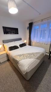 Postel nebo postele na pokoji v ubytování Steyn Guest Lodge