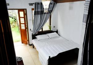Кровать или кровати в номере Mount Nook Holiday Bungalow